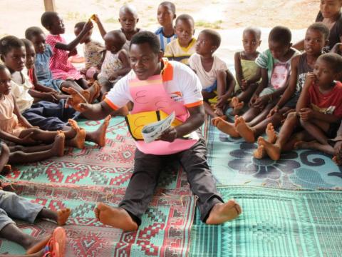 Elijah reads to children at a World Vision reading camp in Ghana Elijah reads to children at a World Vision reading camp in Ghana